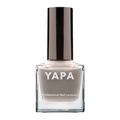 Charlotte Nail Lacquer | YAPA in a sleek glass bottle featuring a muted taupe shade of professional nail lacquer with a black cap for a polished manicure look.