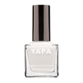 Clear glass bottle of Connie (Color: White) Nail Lacquer | YAPA with black cap featuring a sleek, professional design for premium nail care and polish application.