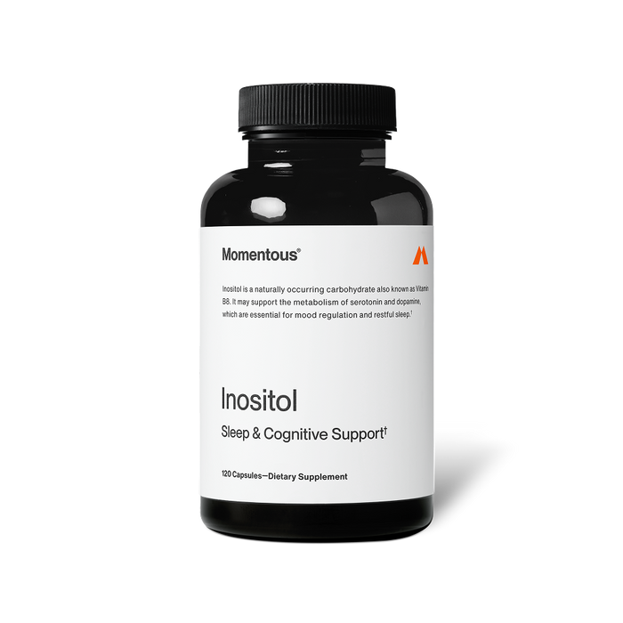 A black bottle of Inositol dietary supplement by Momentous featuring sleep and cognitive support, designed for wellness and mood regulation.
