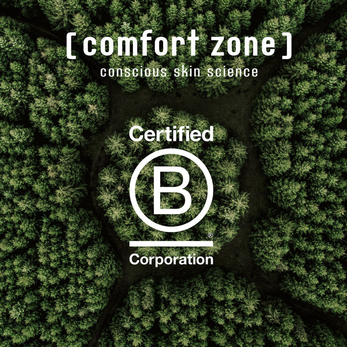 Aerial view of dense green forest surrounding the text "Certified B Corporation" and "[ comfort zone ] conscious skin science," promoting the Sacred Nature Exfoliant Mask | [ comfort zone ] skincare with a focus on sustainability.
